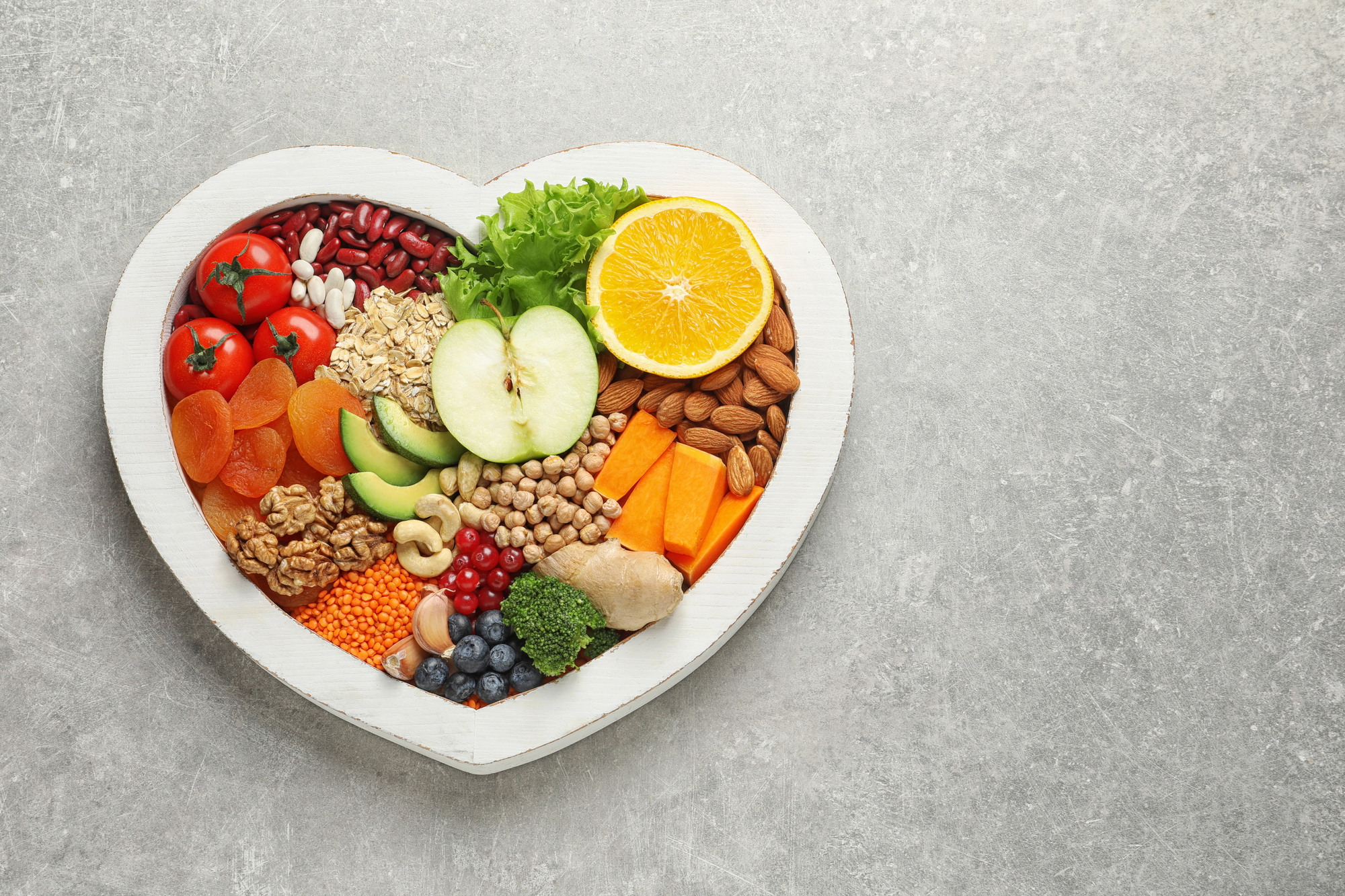 nutrition foods on a heart-shaped plate